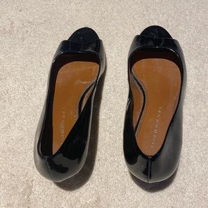 Black patent open toed kitten heel. Size 9. Worn a few times. In good condition